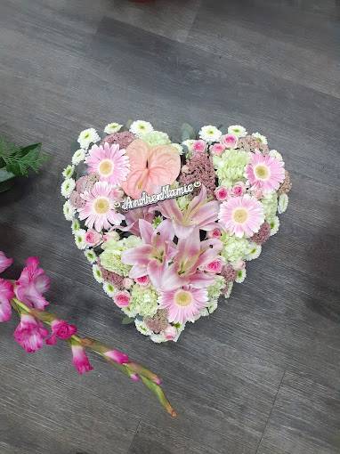 Coussin de fleurs roses et blanches
